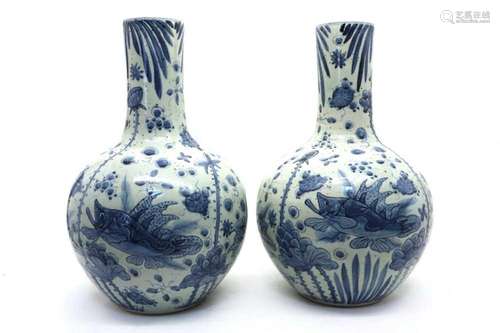 A pair of Chinese blue and white vases,