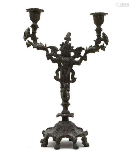 A Thai bronze twin branch candelabra