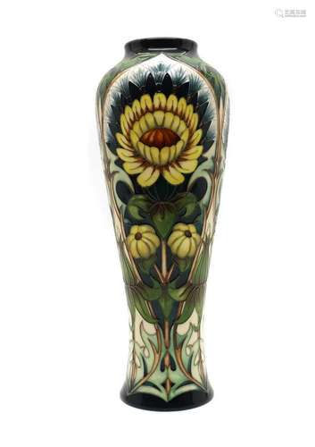 A limited edition Moorcroft pottery Dandelion pattern vase...