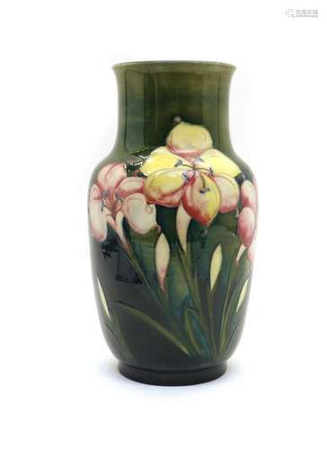 A Walter Moorcroft pottery African Lily pattern vase,