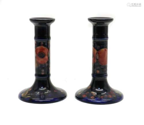 A pair of William Moorcroft pottery Pomegranate pattern ca...