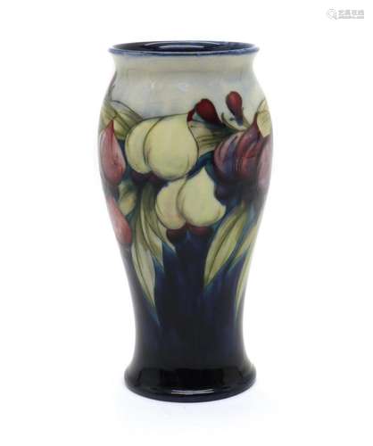 A William Moorcroft pottery 'Wisteria' pattern vase