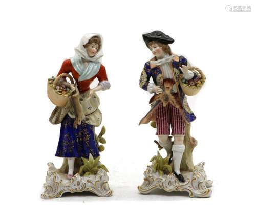 A pair of Capodimonte figures,