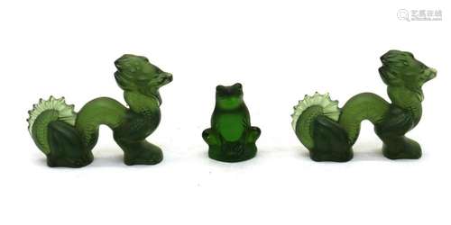 A pair of green Lalique moulded glass Zodiac dragons,