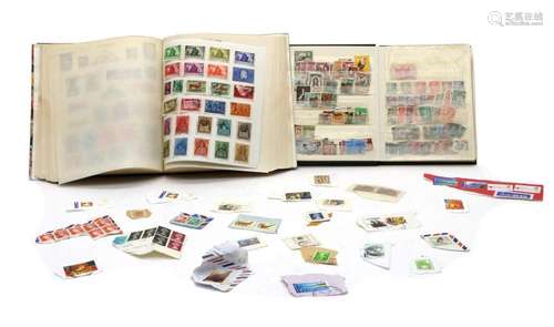 A world collection of stamps in four albums,