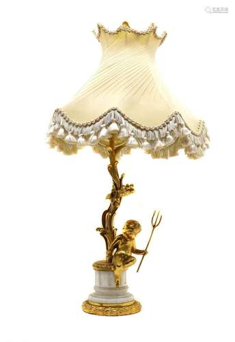 A gilt table lamp