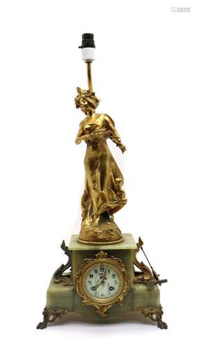 A late Victorian French bronze and green onyx mantel clock l...