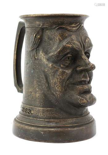 A cast bronze presentation tankard,