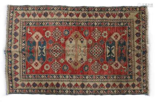 A Kazak rug,