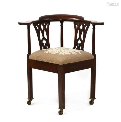 A George III mahogany corner chair,