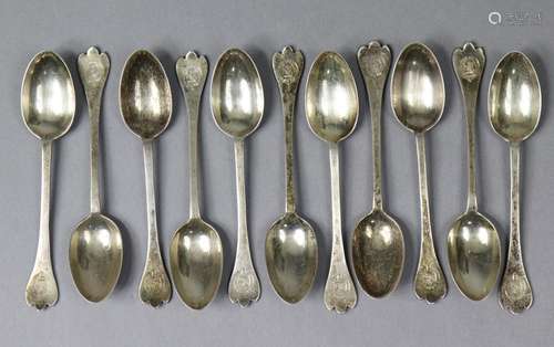 Eleven George V silver rat-tail trefid coffee spoons with en...