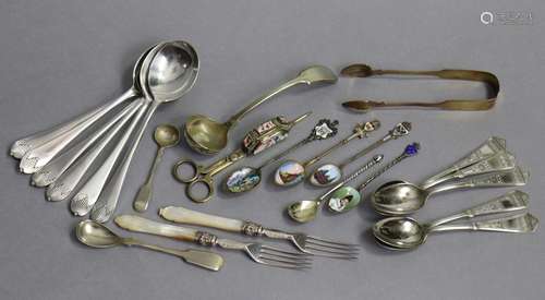 Four continental silver souvenir teaspoons with painted enam...