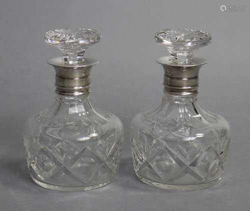 A pair of Stuart Crystal heavy cut glass decanters with mush...