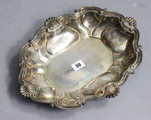 A Peruvian sterling large oval dish with raised lobed sides ...