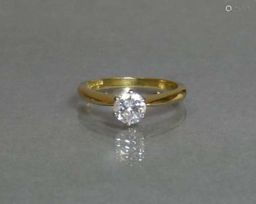 A diamond solitaire, the round-cut stone weighing approx. 0....