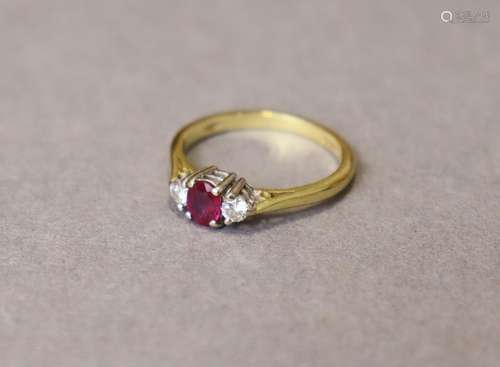 A ruby & diamnond ring, the oval-cut ruby weighing appro...