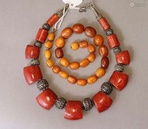 A ‘butterscotch’ amber necklace, the graduated oval beads of...