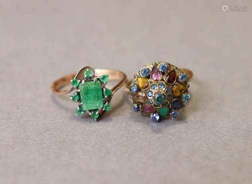 A multi-gem cluster ring set to a 14K shank, size: L; weight...