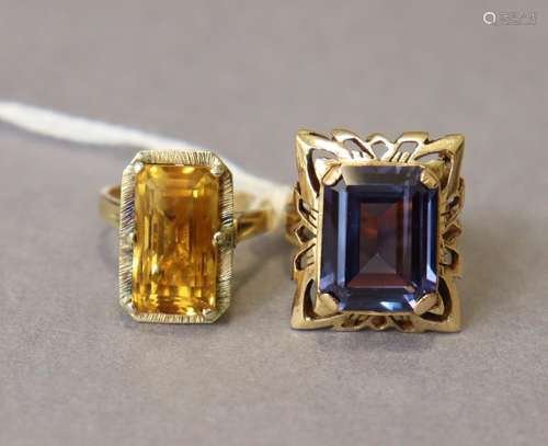 A 9ct. gold ring set large rectangular simulated amethyst, s...