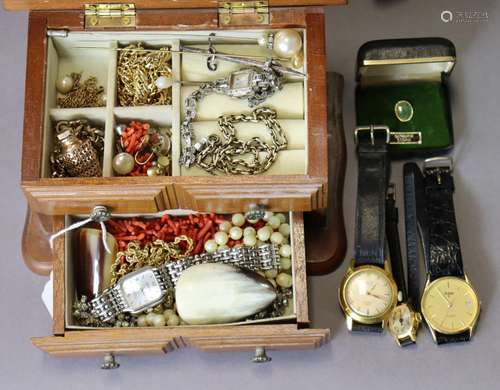 A quantity of costume jewellery, wristwatches, etc., in a sm...