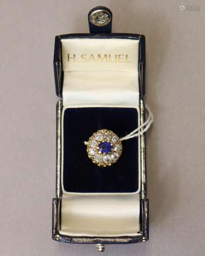 A sapphire & diamond cluster ring, the central oval sapp...