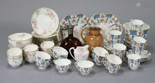 An English porcelain part tea & coffee service with flor...