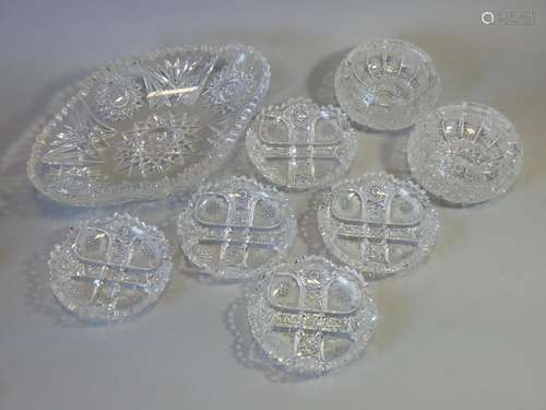 A heavy cut glass oval dish with serrated rim, 12” x 8”; fiv...