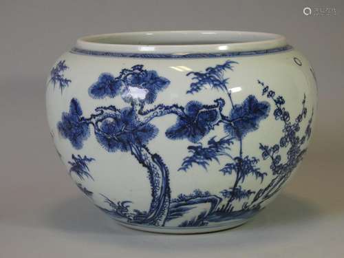 A Chinese blue & white porcelain jardiniere of squat rou...