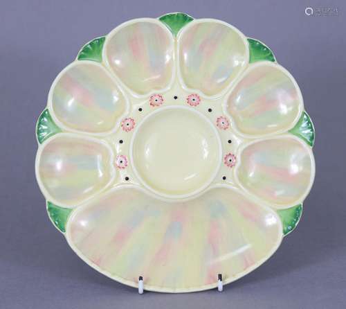 A Minton pottery oyster dish painted in pearlescent enamels,...