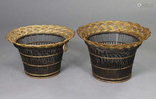 A pair of black & gilt painted wicker waste paper basket...