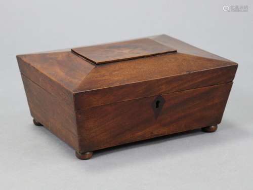 An early Victorian mahogany sarcophagus-shaped work box with...