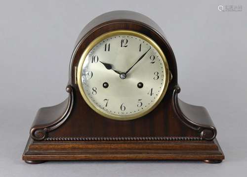 An early 20th century mantel clock in mahogany dome-top case...