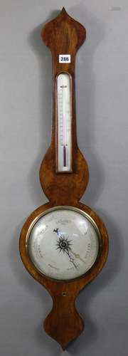 A Victorian walnut banjo barometer with 8” silvered dial, br...