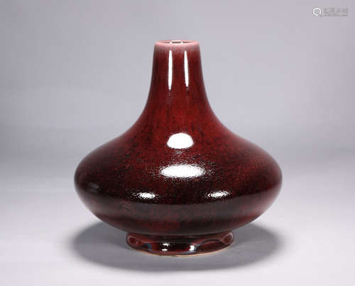 Qianlong red glazed water chestnut bottle in Qing Dynasty