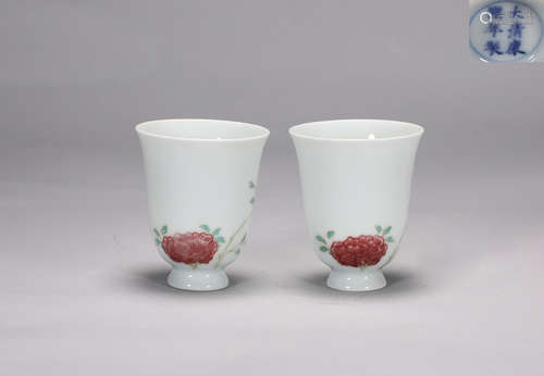 A pair of underglaze red flower cups in Kangxi of Qing Dynas...