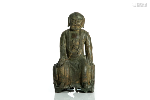 CHINESE MING BRONZE SEATED FIGURE OF A FOREIGNER