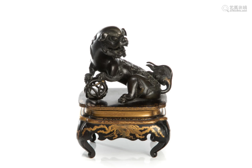 CHINESE BRONZE FU LION ON GILT LACQUER WOOD STAND