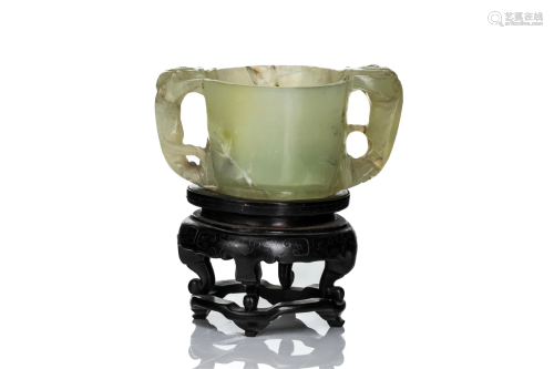 CHINESE JADE TWO HANDLED CUP ON WOOD STAND
