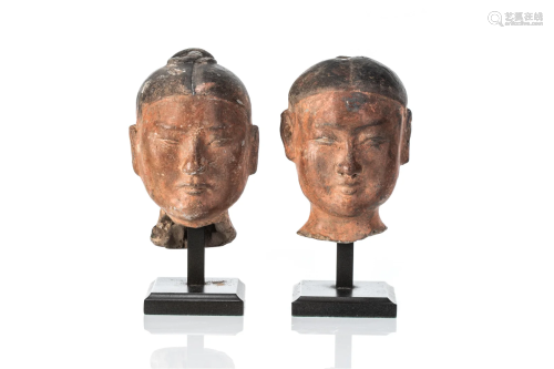 TWO CHINESE HAN DYNASTY POTTERY HEADS