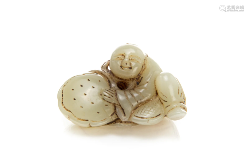 CHINESE CARVED JADE BOY WITH LOTUS SEED POD