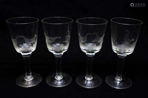 Four engraved cock fighting wine glasses