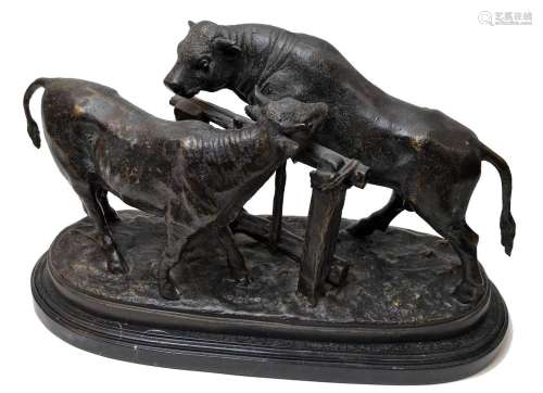 After Pierre-Jules Mêne: a bronze group of cow and bull,