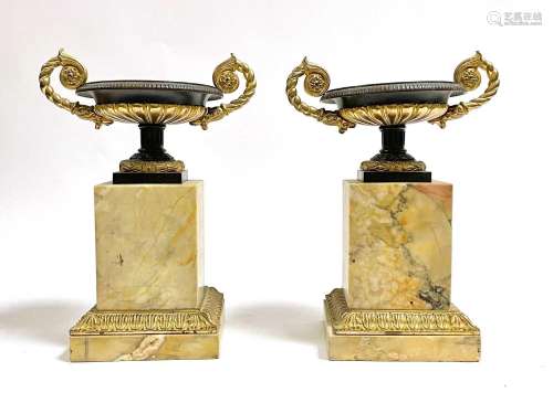 A pair of late 19th Century Grecian Revival parcel-gilt bron...