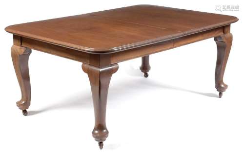 A substantial mahogany extending dining table.