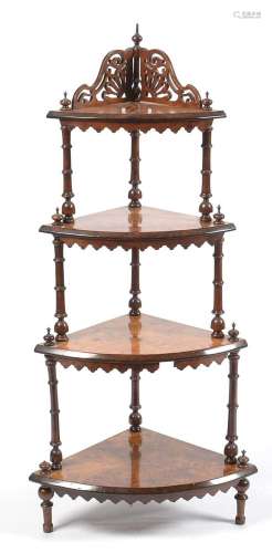 A Victorian burr walnut graduated four tier what-not