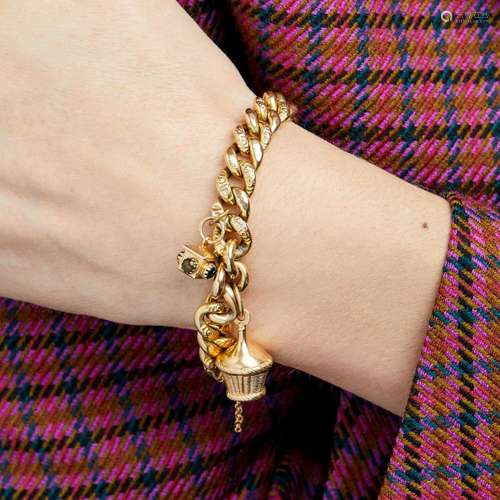 BRACELET GOURMETTE BRELOQUES A 18K yellow gold charm's a...