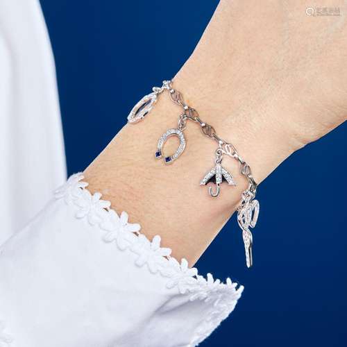 BRACELET SIX CHARM'S JOAILLERIE A diamond, sapphires and...