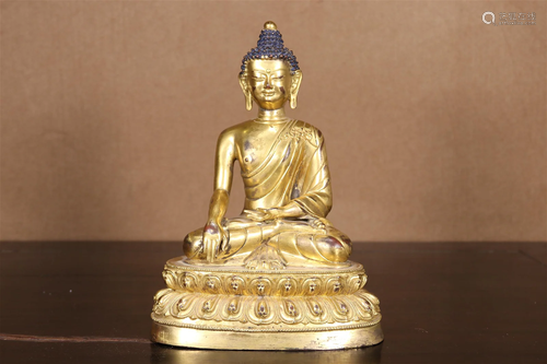 A Gilt-Bronze Figure Of Buddha Shakyamuni