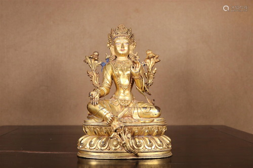 A Gilt-Bronze Figure Of Tara