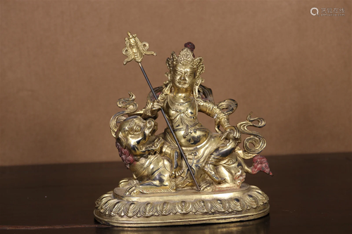 A Gilt-Bronze Figure Of Yellow Jambhala